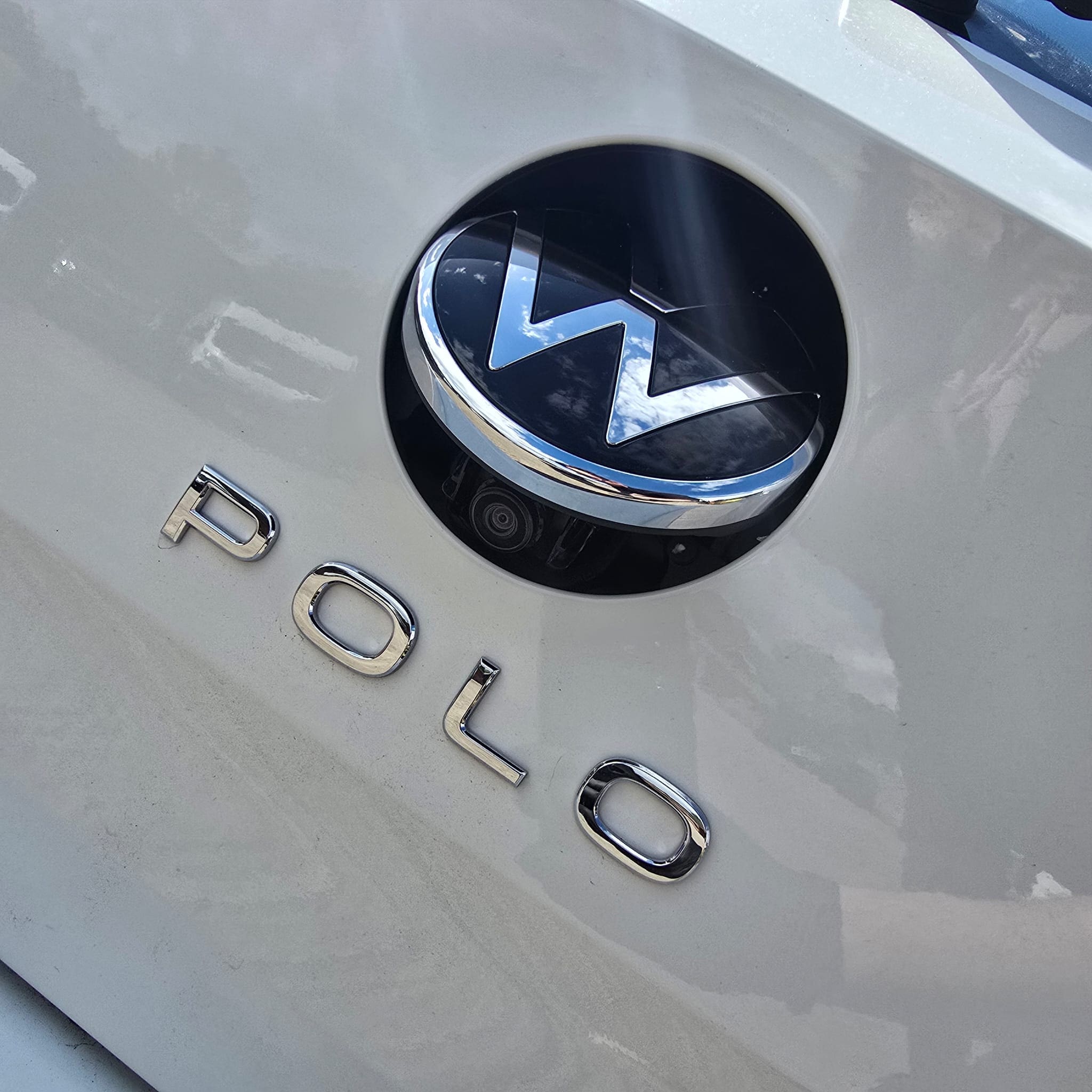 2023 VW Polo reverse camera retrofit with OEM pop out badge camera and BlackVue dash cam installation