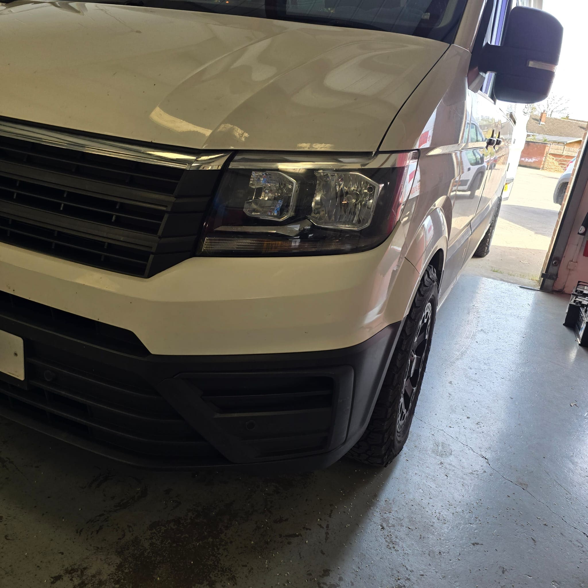 Volkswagen Crafter custom retrimmed flat bottom steering wheel with perforated sides