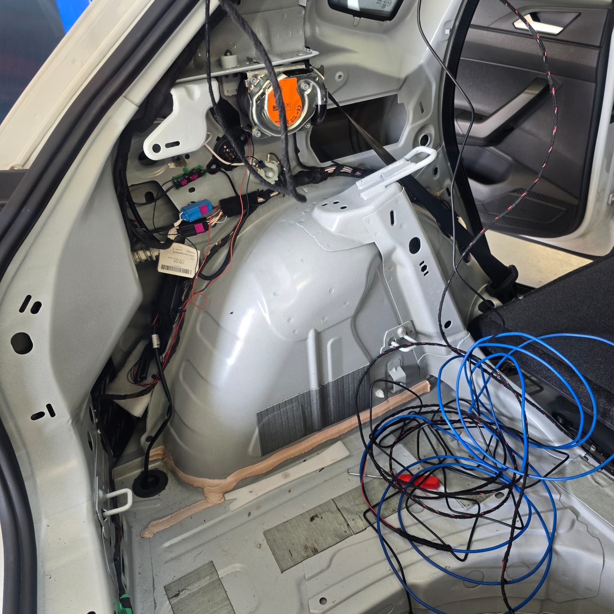 VW Polo reverse camera retrofit with OEM pop out badge camera and BlackVue dash cam
