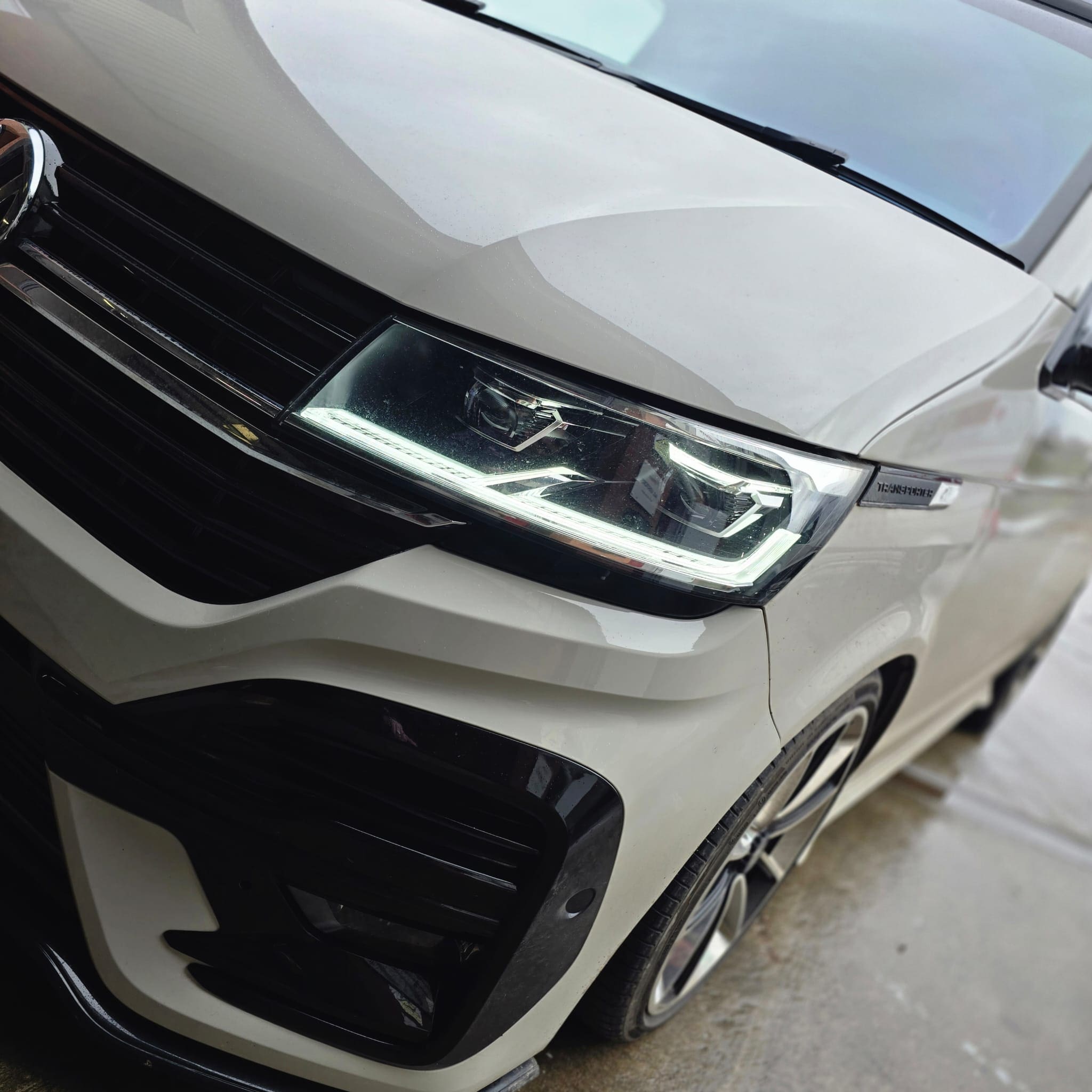 VW T6.1 heated steering wheel retrofit retrimmed in leather and black Alcantara with OEM heat control