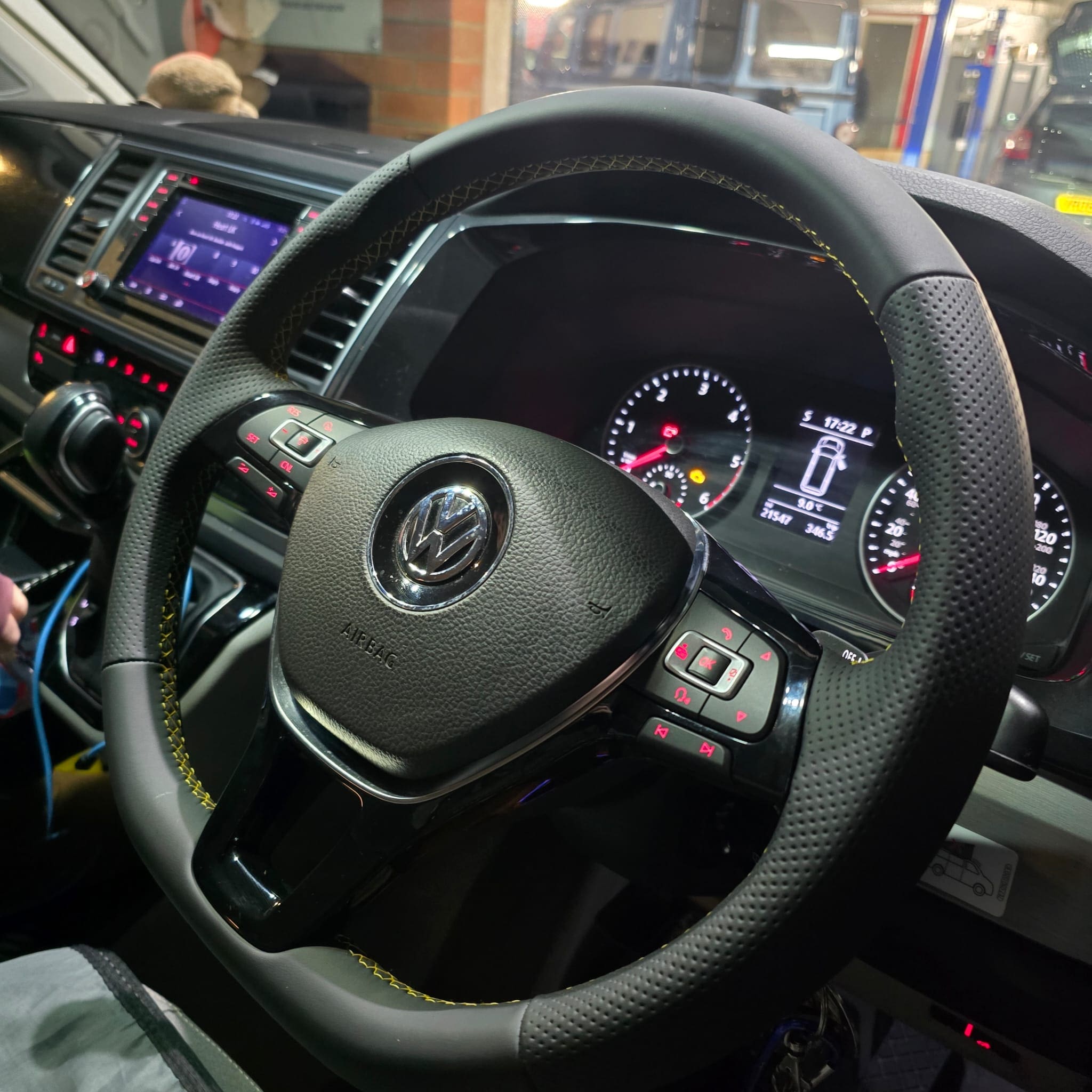 VW Transporter T6 steering wheel retrofit retrim with Nappa leather perforated sides and yellow stitching